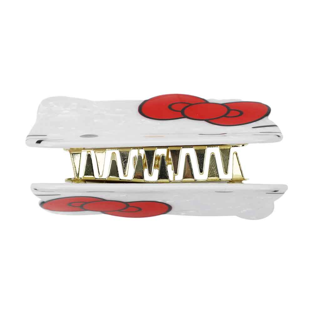 Close-up of the acrylic material used in the Hello Kitty claw clip.
