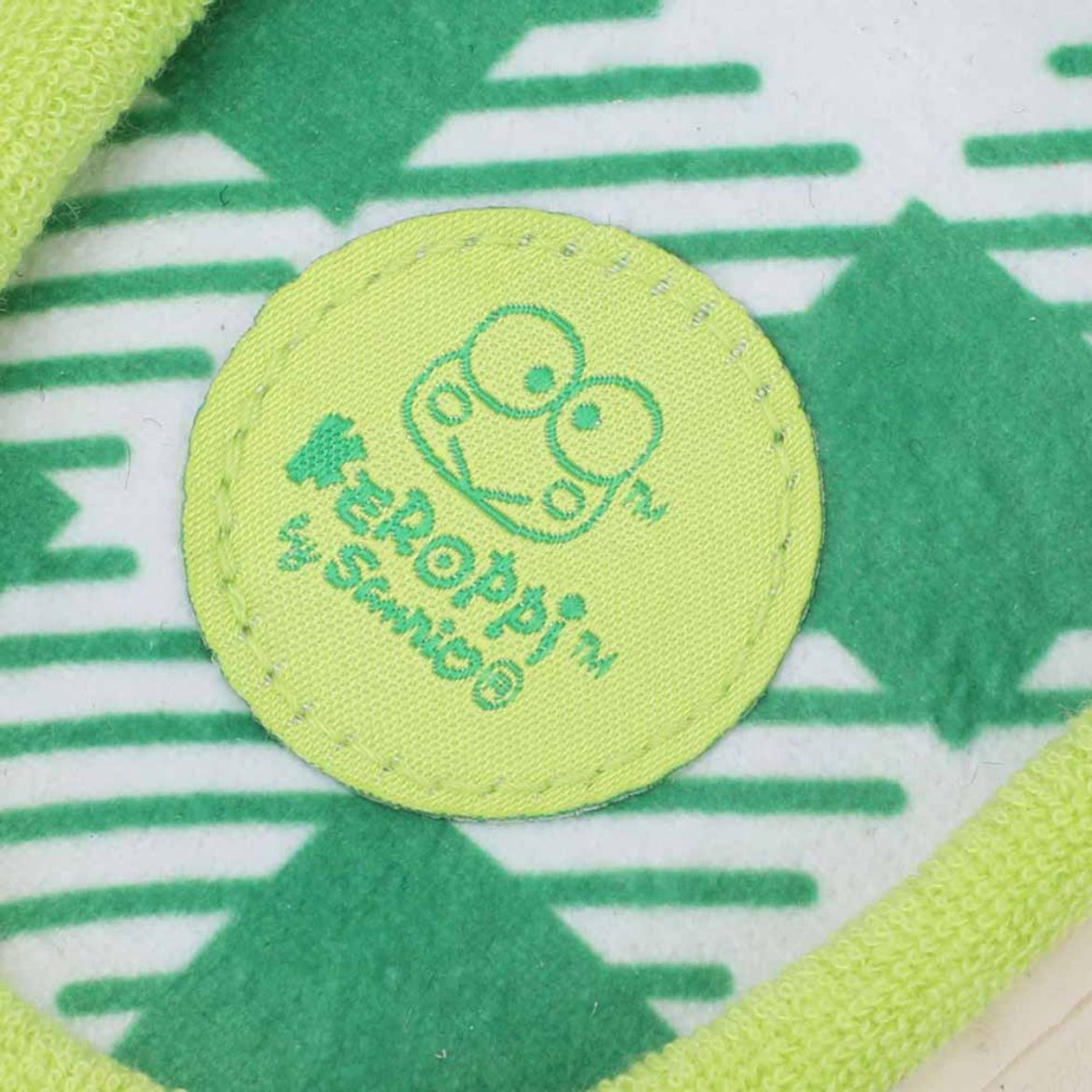 Keroppi slides styled with comfortable loungewear in a cozy indoor setting