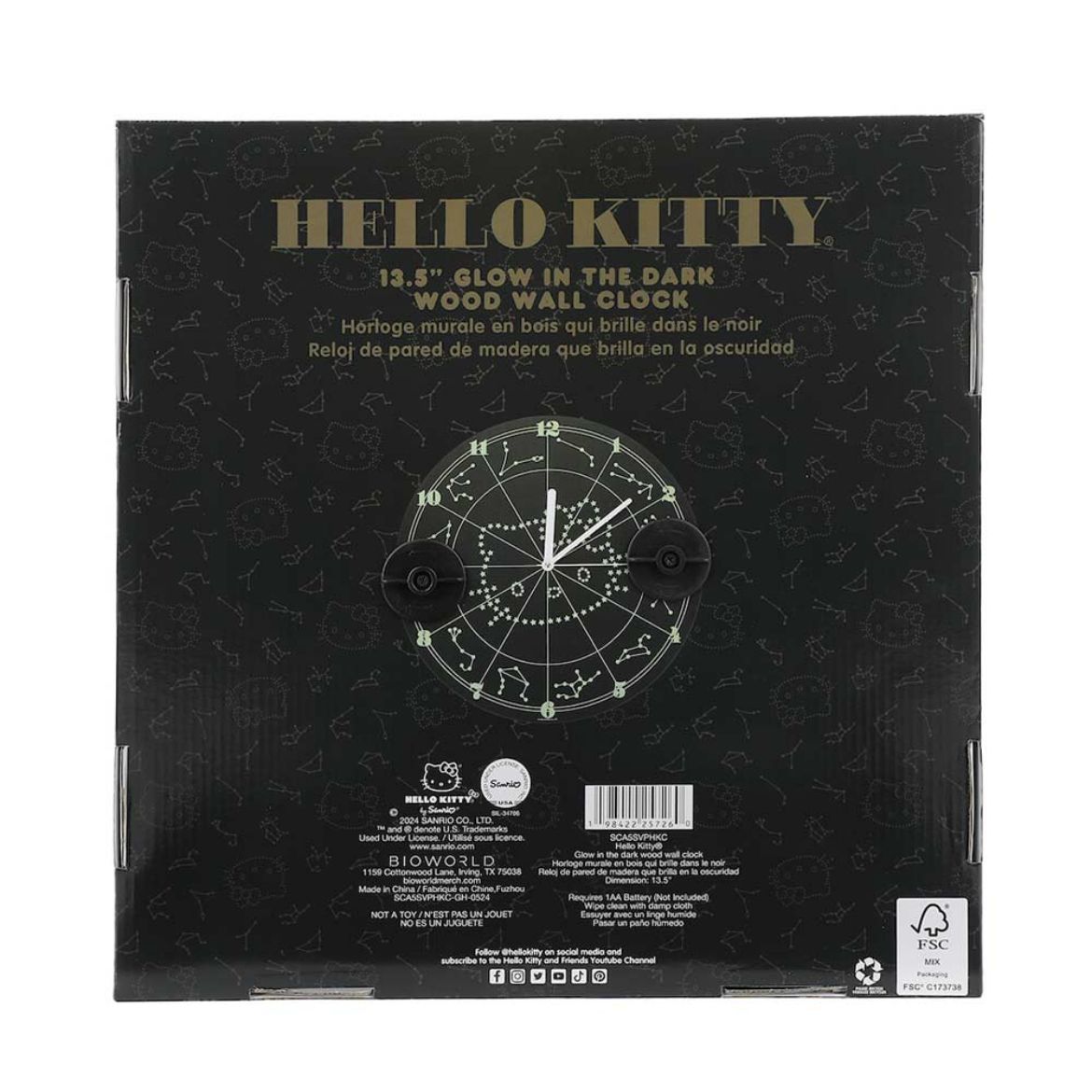 Side angle of hello kitty wall clock mounted in cozy bedroom setting