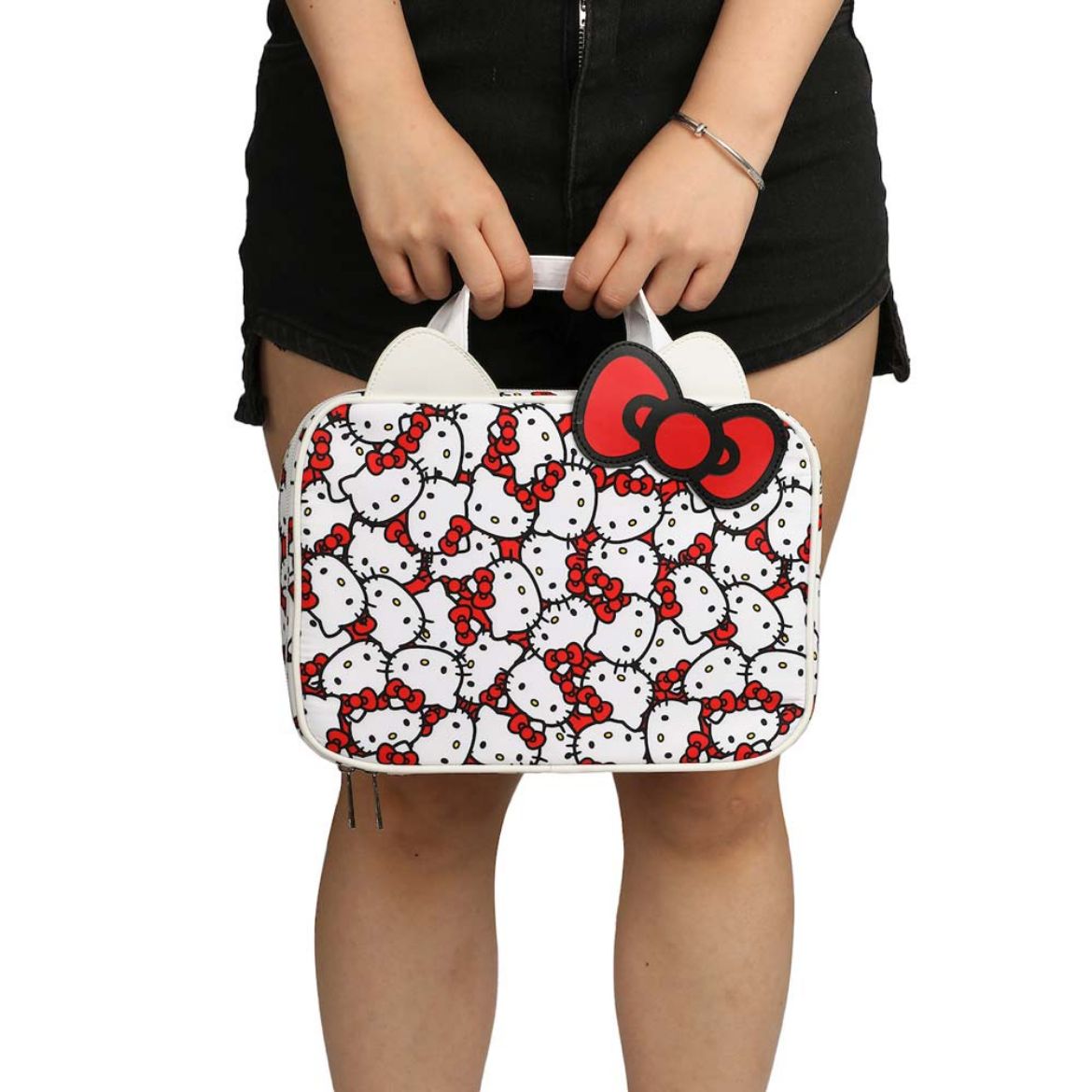 Side angle of Hello Kitty toiletry bag hung in a bathroom setting
