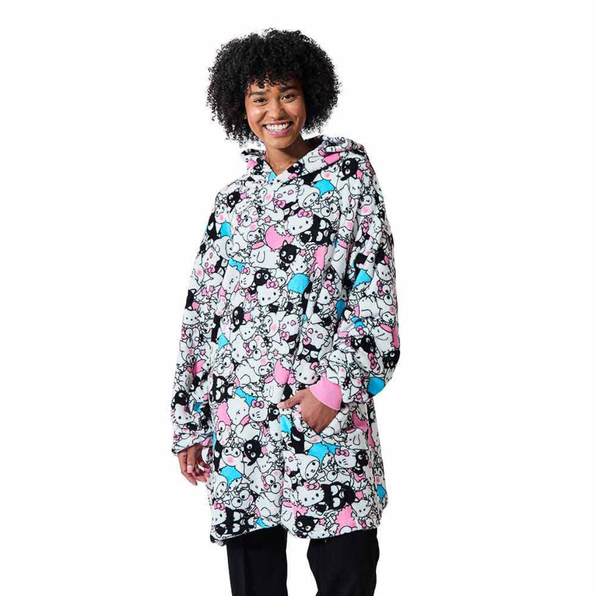 Hello Kitty hoodie showcasing side pockets and oversized fit.