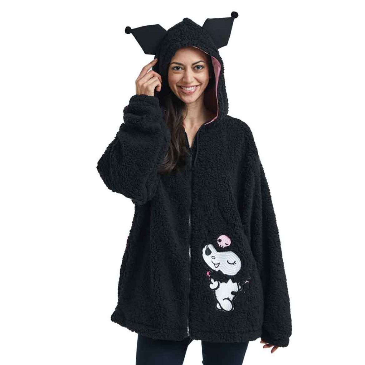Kuromi sherpa hoodie worn by a woman on a cozy movie night