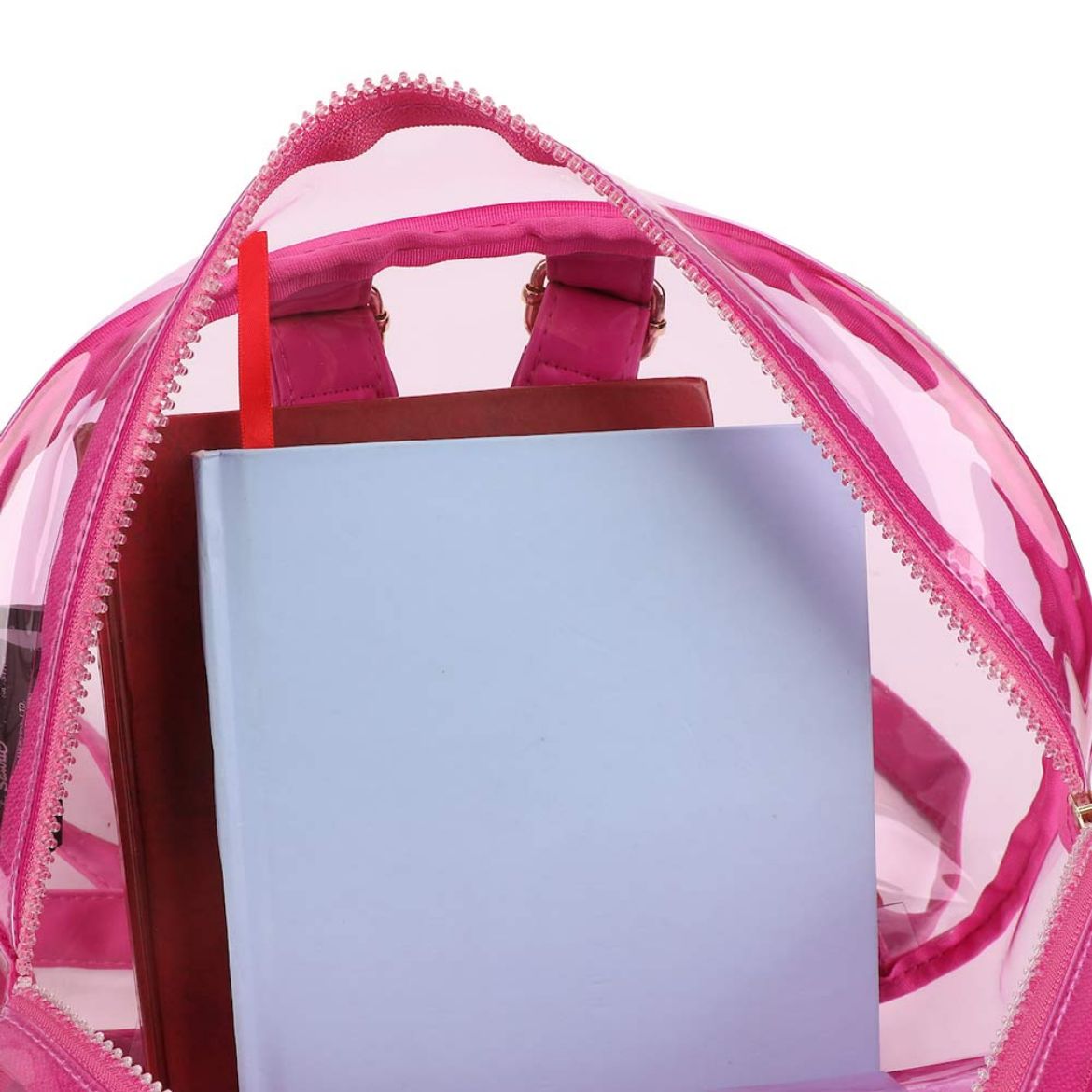 Front view of Hello Kitty clear backpack with pink details, worn over a denim jacket.