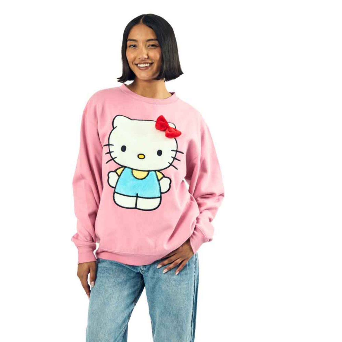 Close-up of plush embroidered Hello Kitty patch and applique accents