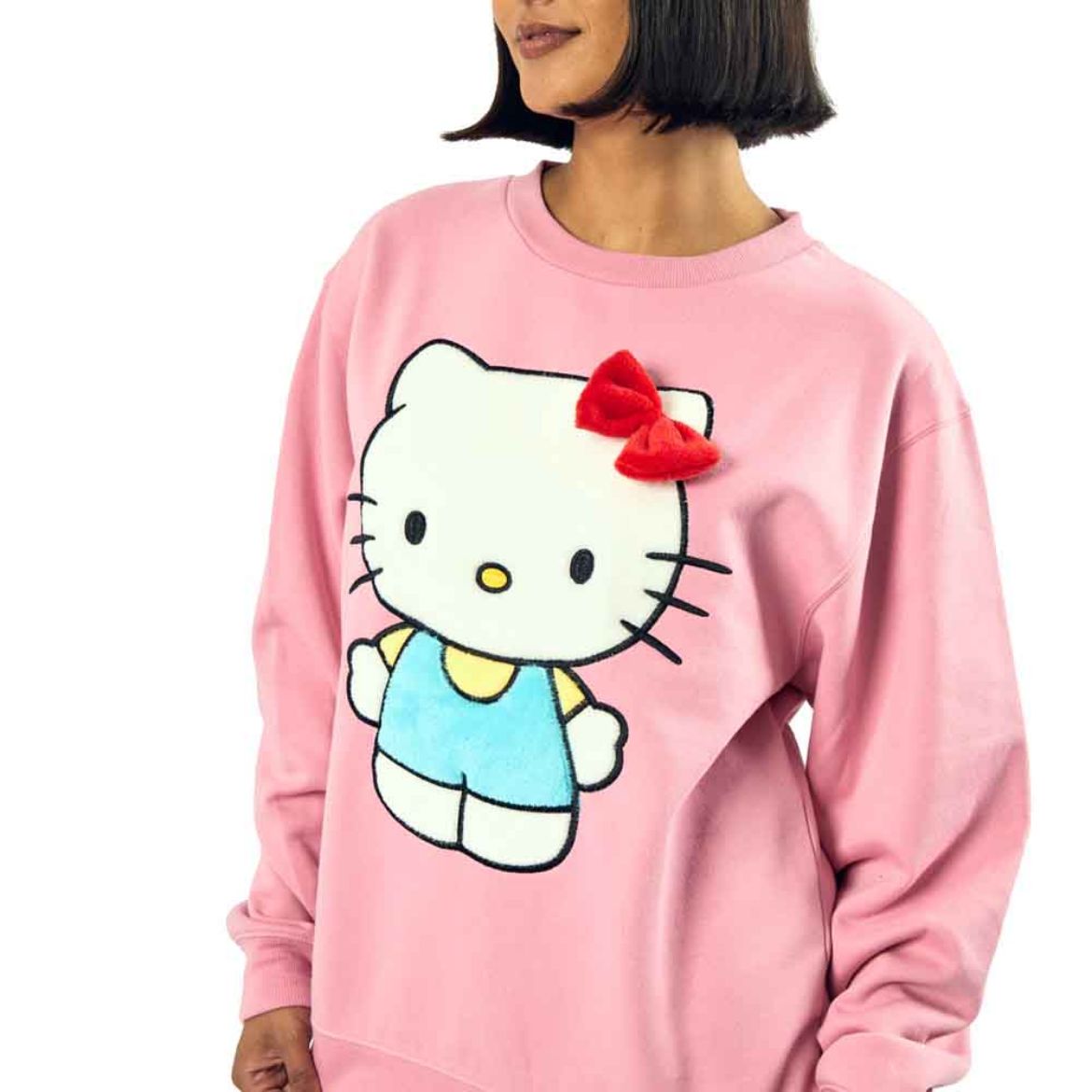 Front view of pink oversized Hello Kitty sweatshirt with 3D bow detail