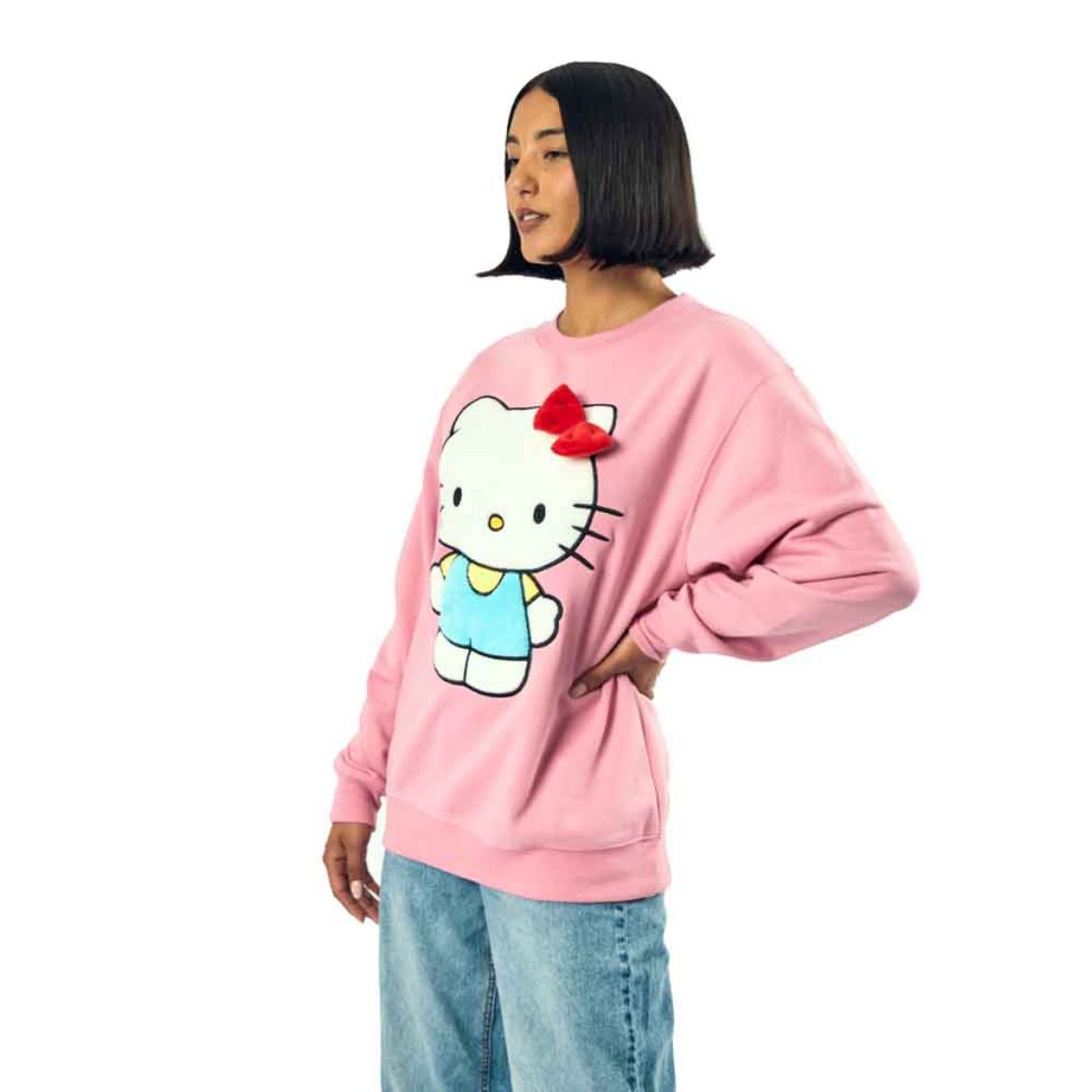 Front view of pink oversized Hello Kitty sweatshirt with 3D bow detail