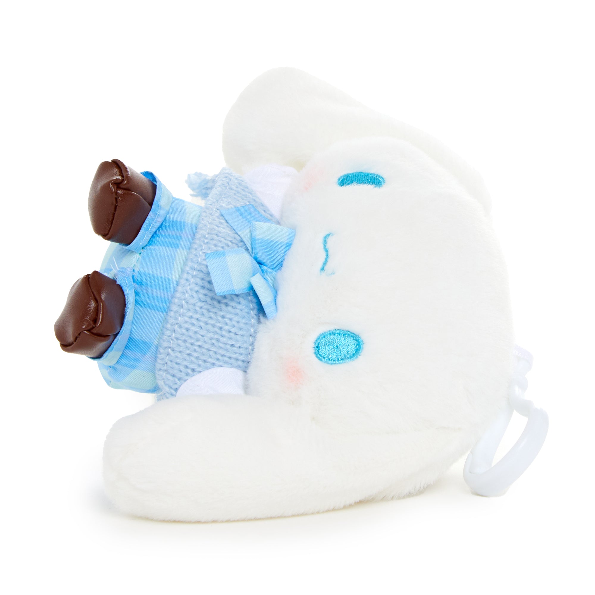 Cinnamoroll hair clip attached to a stylish tote bag.