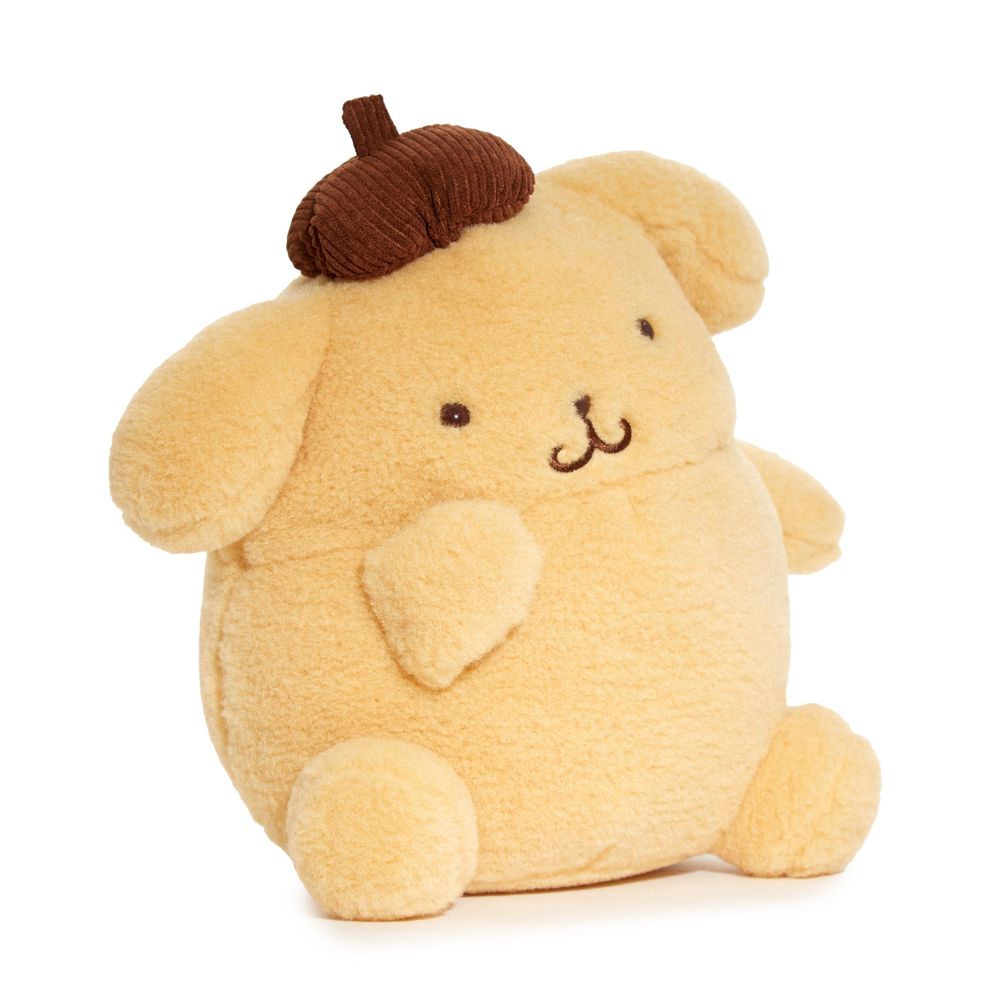 Pompompurin plush toy in a cozy setting, perfect for collectors.