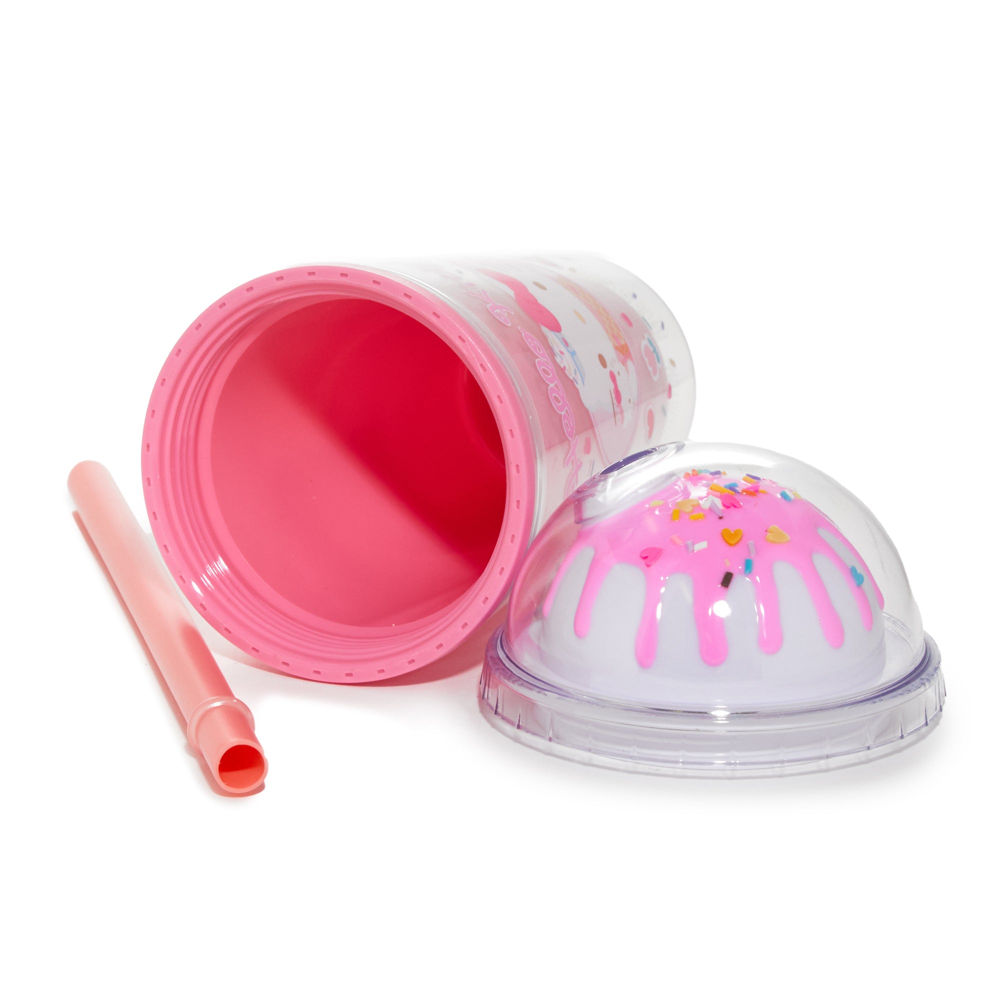 The Hello Kitty acrylic tumbler being used at a summer picnic, with ice cream and other treats nearby.