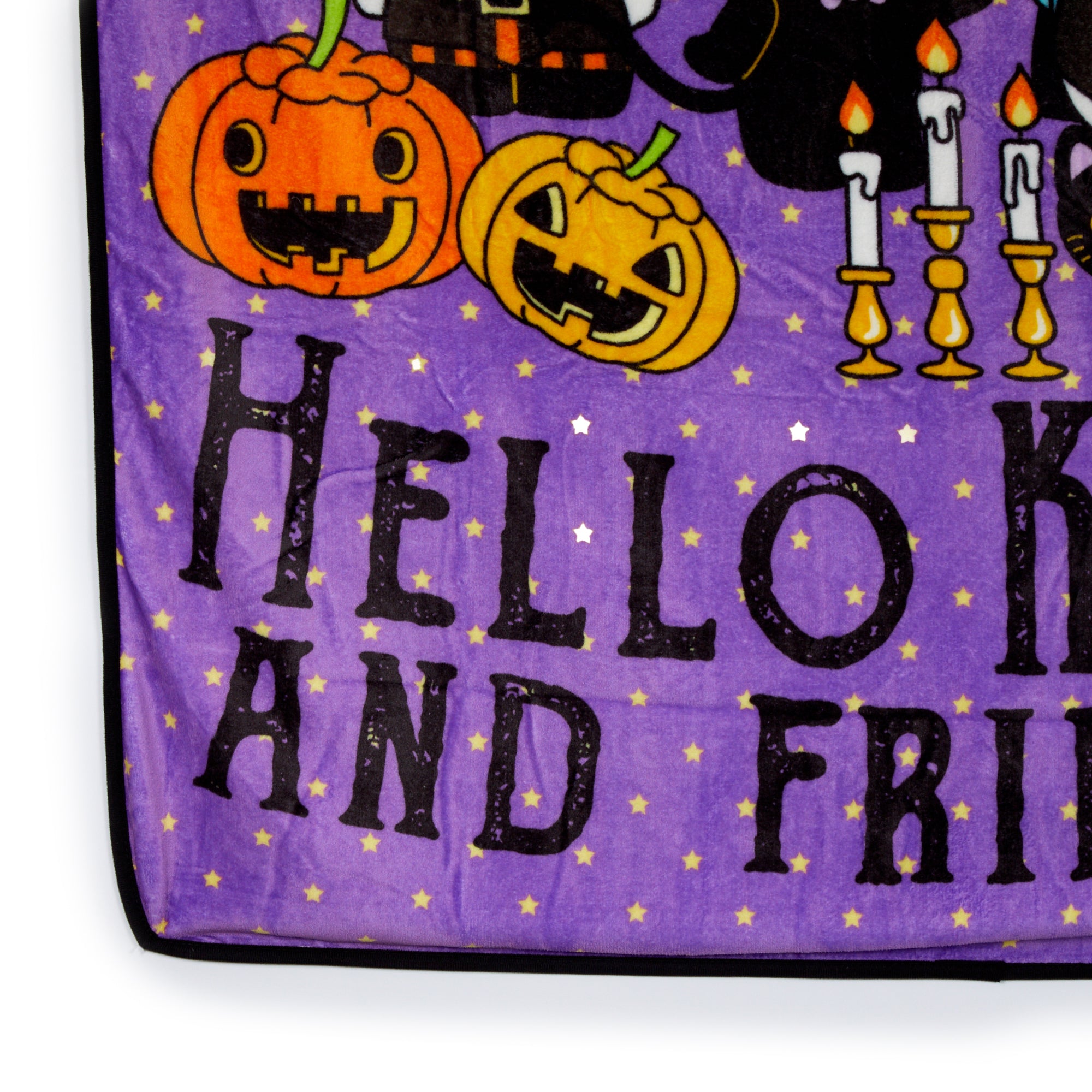 Cozy Hello Kitty Halloween throw blanket with characters in costumes.