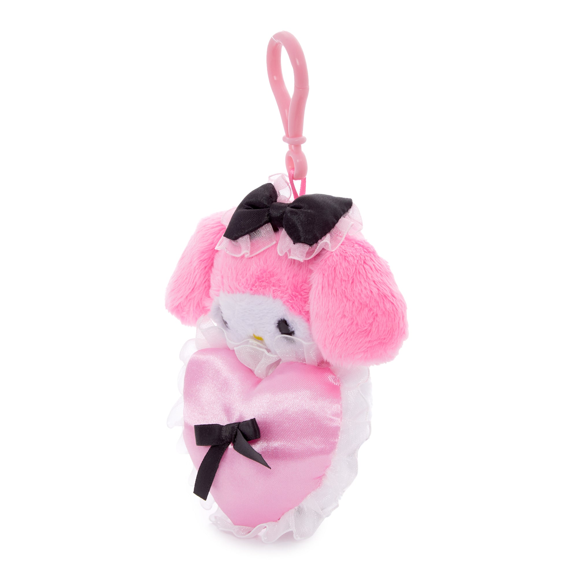 Both mascot clips clipped to a set of keys on a travel pouch