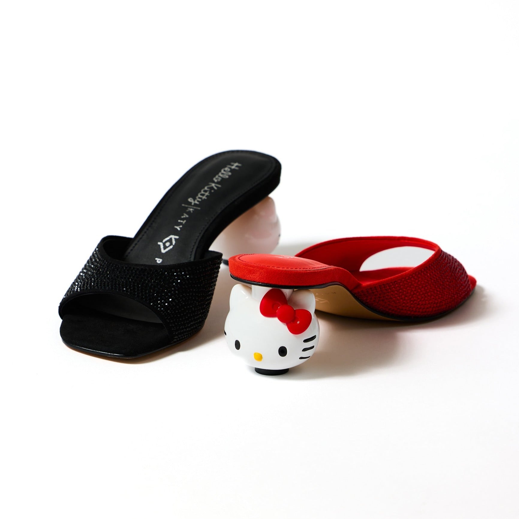 Side profile showing Hello Kitty heel design and memory foam lining