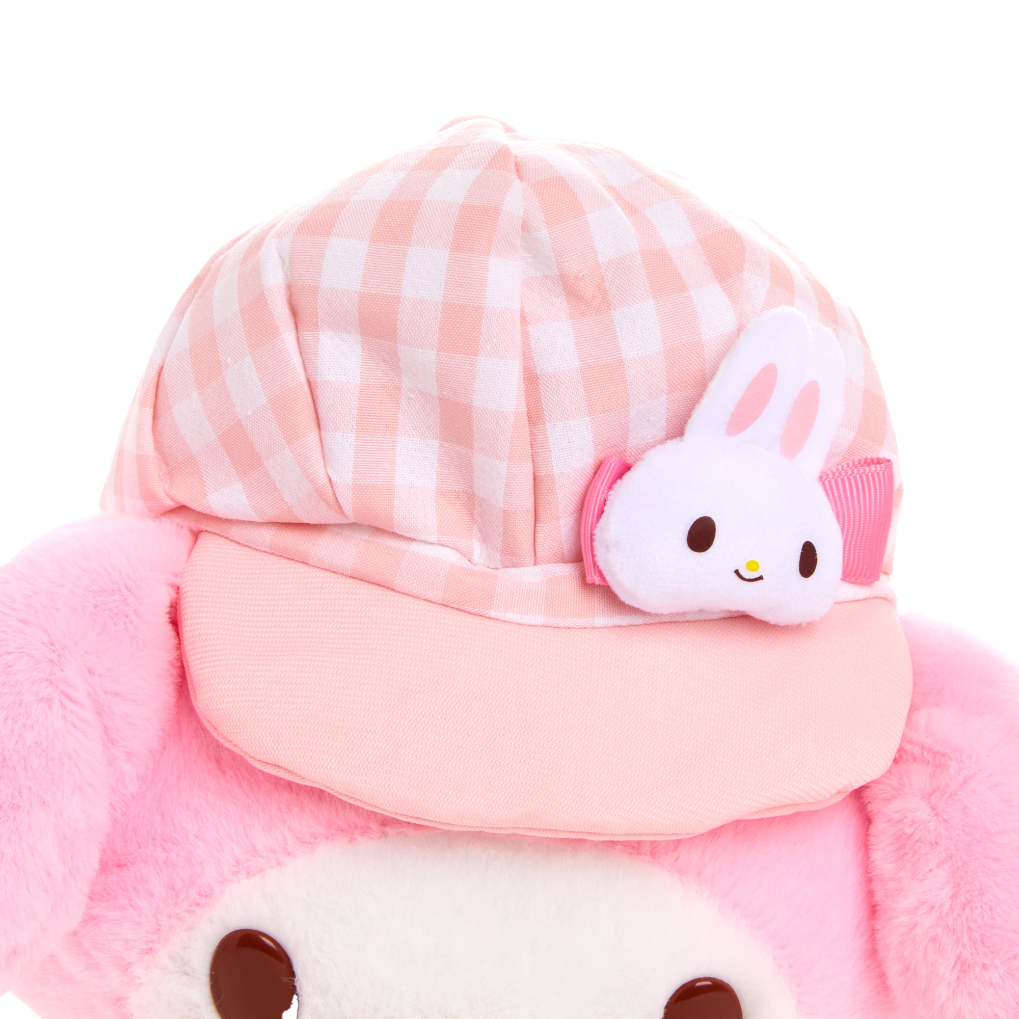 Soft My Melody plush toy with embroidered details and gingham hat, side view