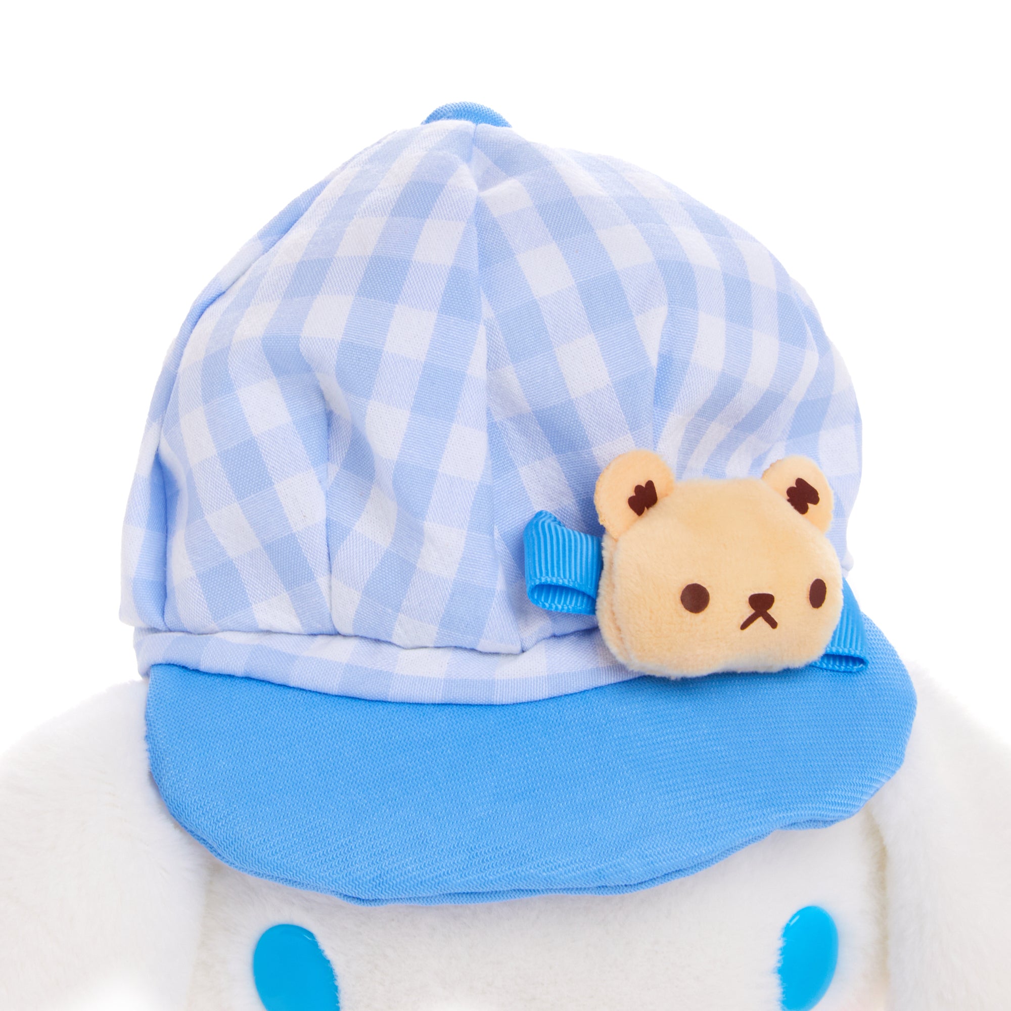 Cinnamoroll plush toy with gingham hat, side angle showing embroidered details