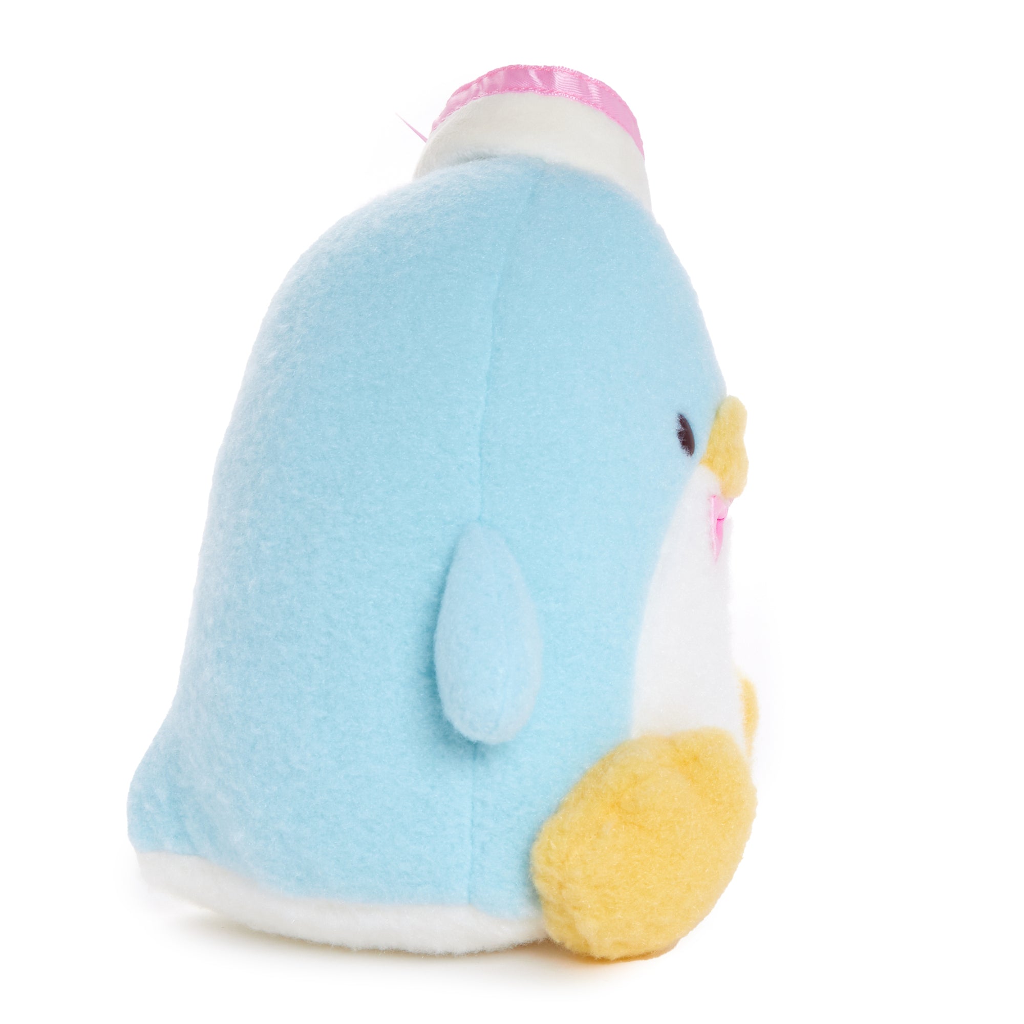 Tuxedosam plush displayed with other cute stuffed animals.