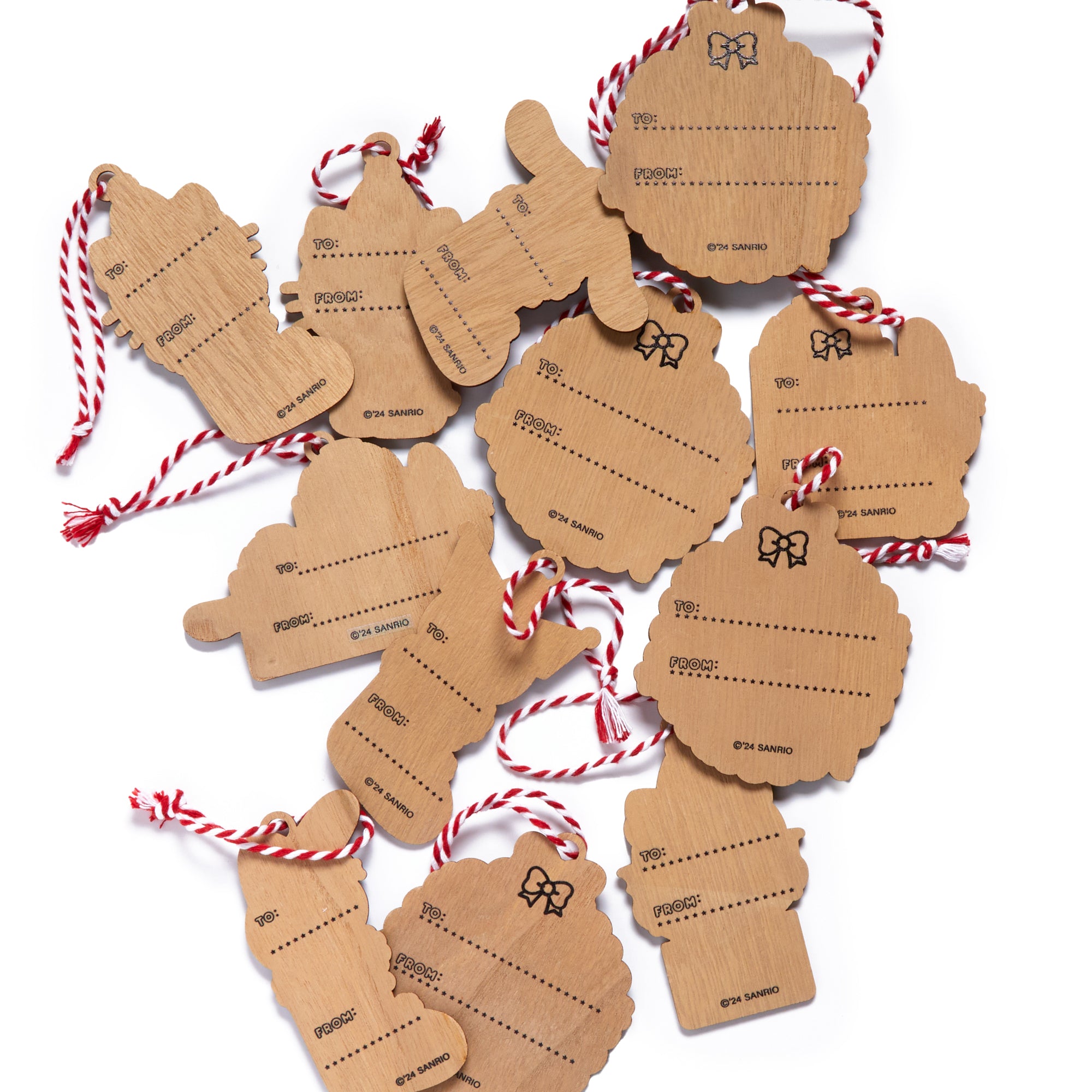 Close-up of Hello Kitty Christmas ornament with hanging loop, perfect for gift toppers or tree decoration