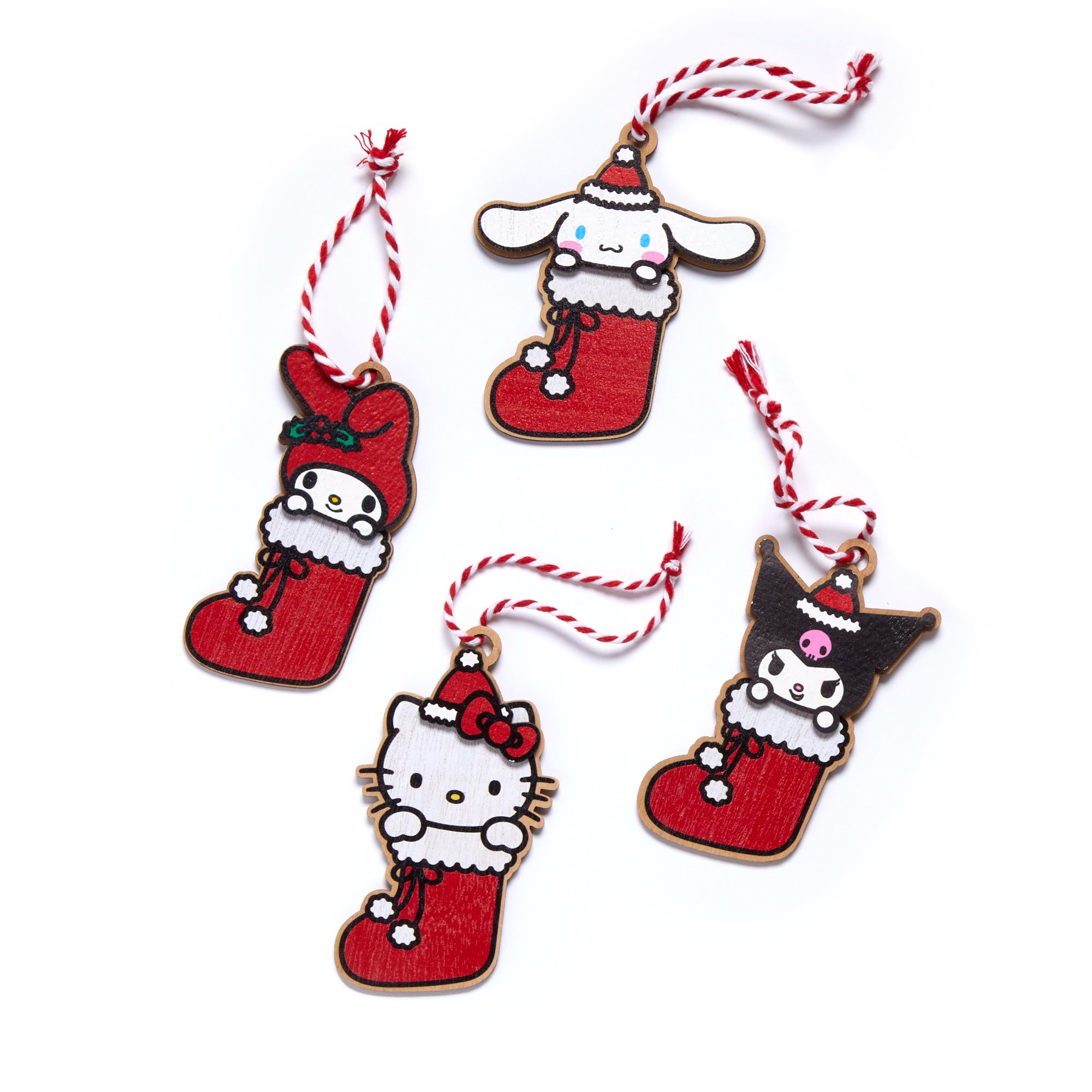 Sanrio Hello Kitty Christmas ornaments displayed on a Christmas tree, with red and white accents