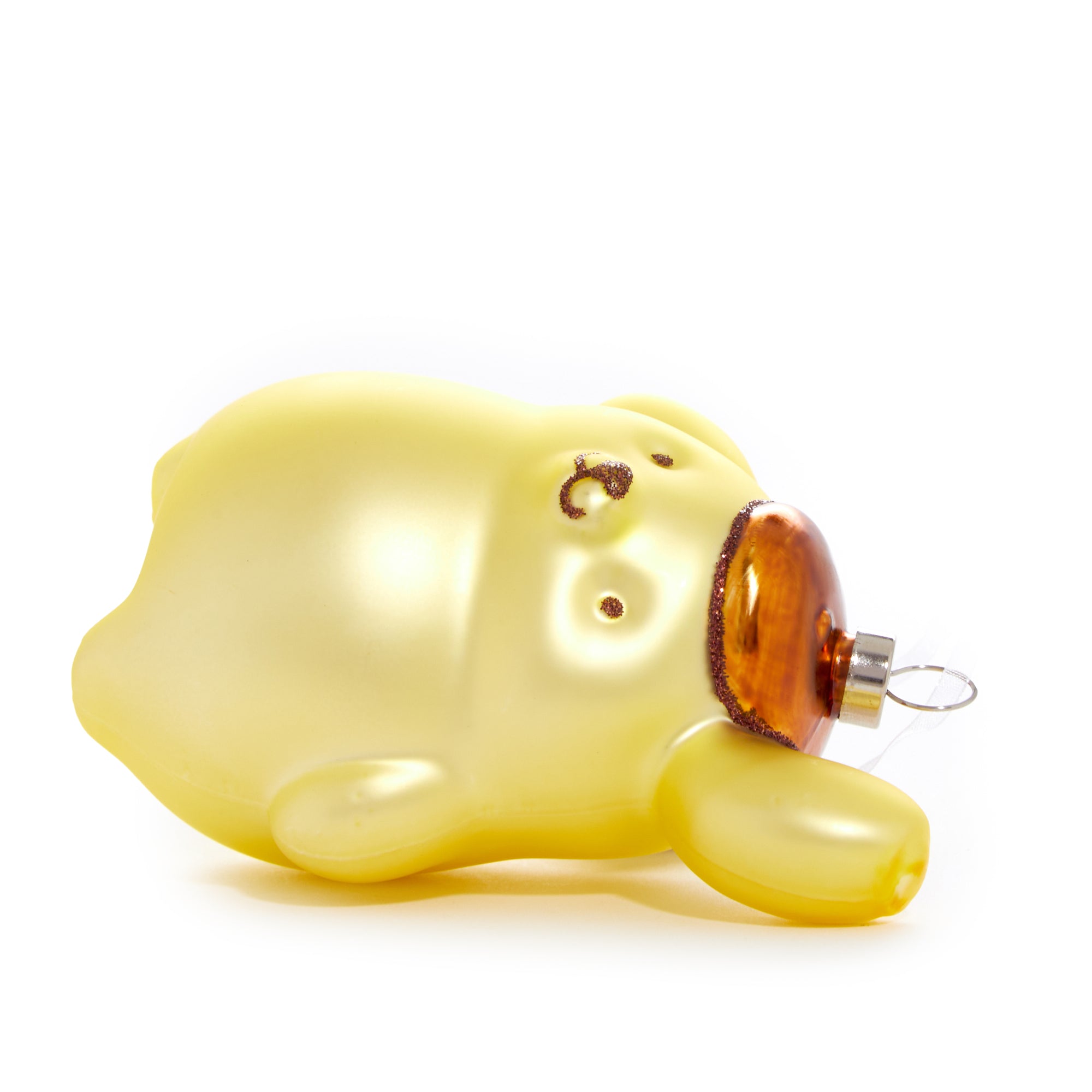 Pompompurin glass ornament on a beautifully decorated Christmas tree.
