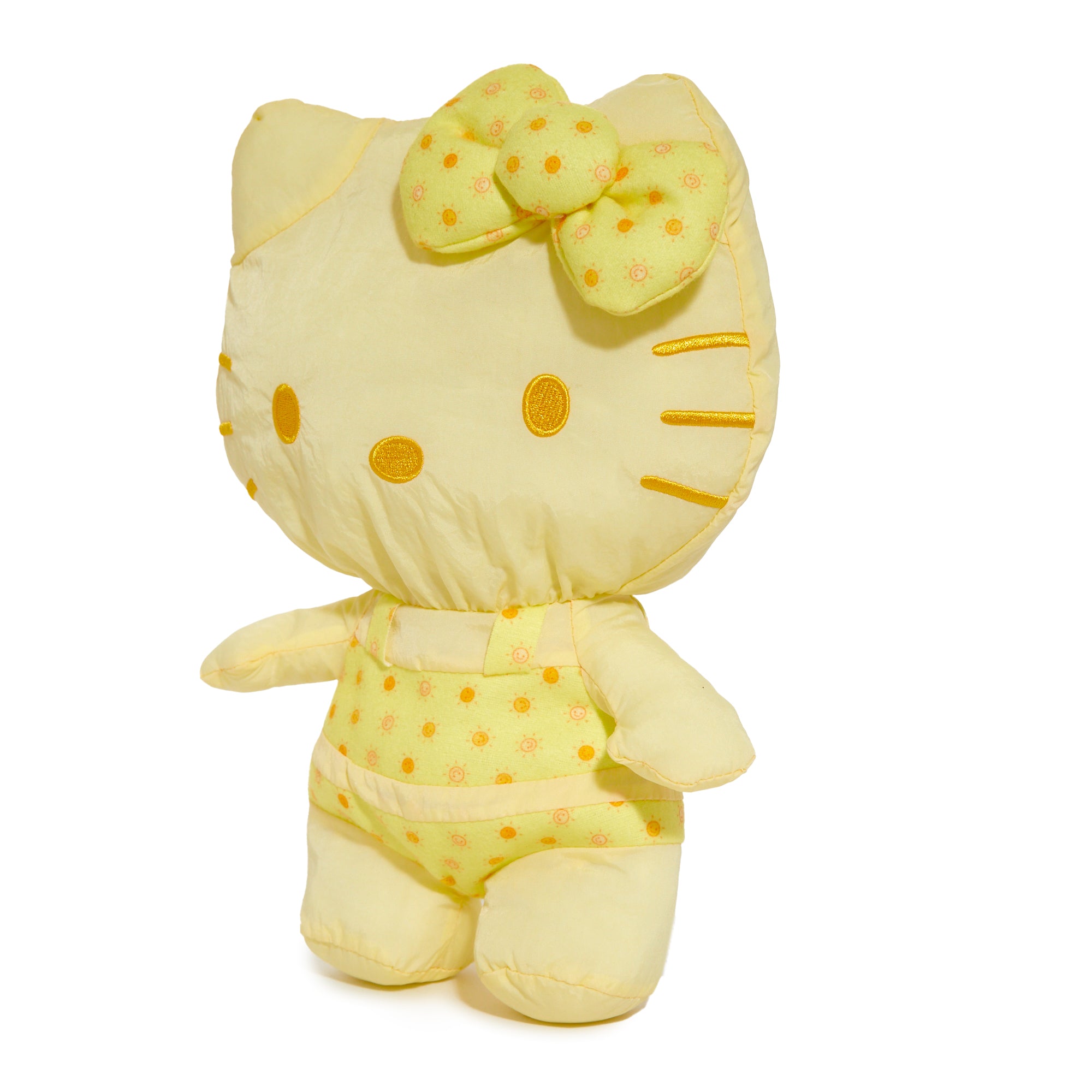 Hello Kitty summer plush toy displayed on a sunny yellow background