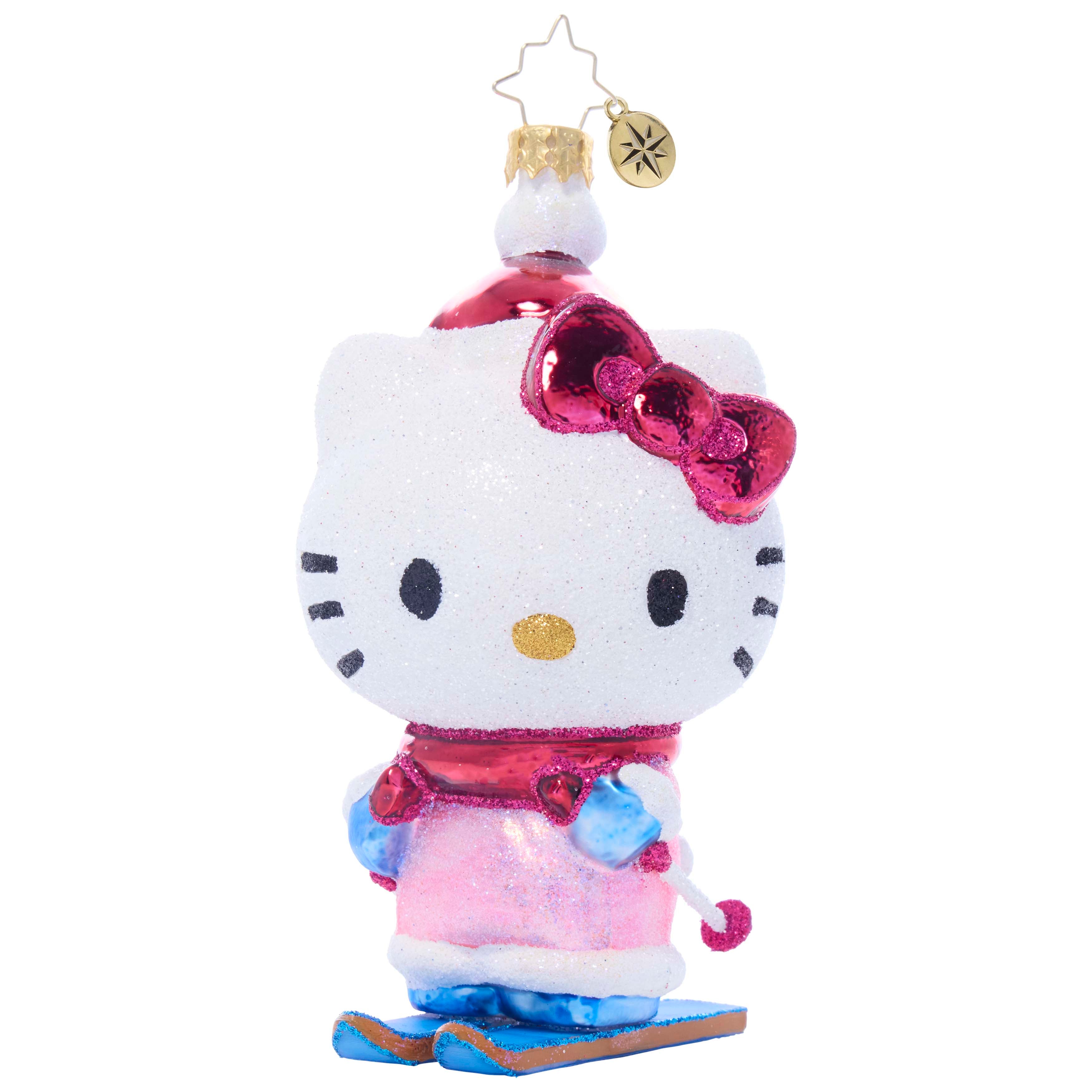 Hello Kitty glass ornament on a Christmas tree, surrounded by other ornaments