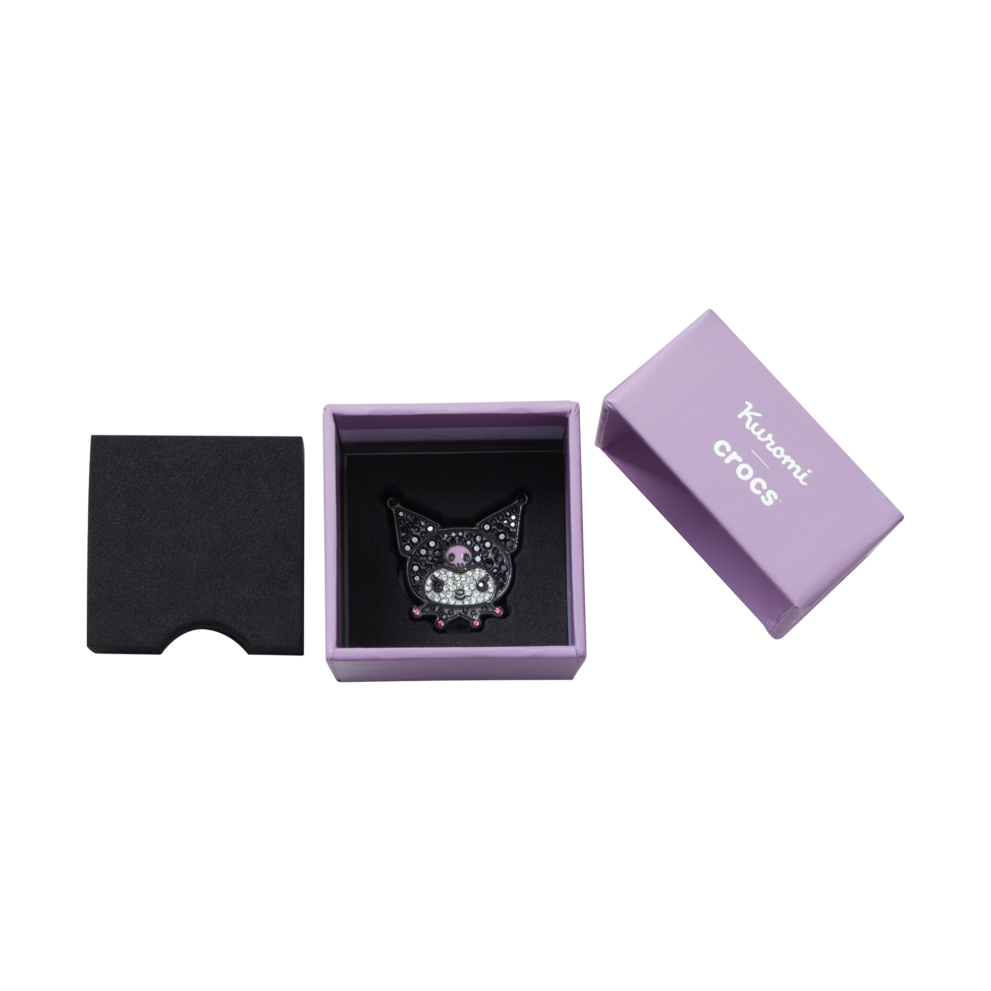 Side view of Sanrio limited edition packaging showing Kuromi Jibbitz in protective case