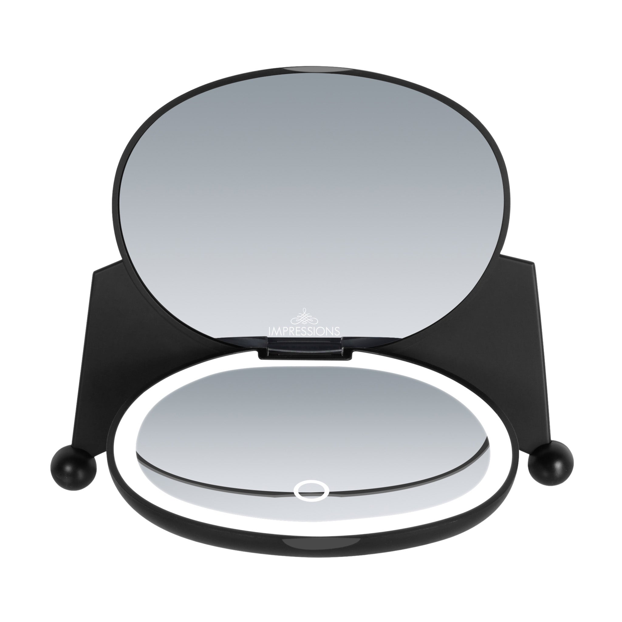 Side-by-side comparison with a standard compact mirror