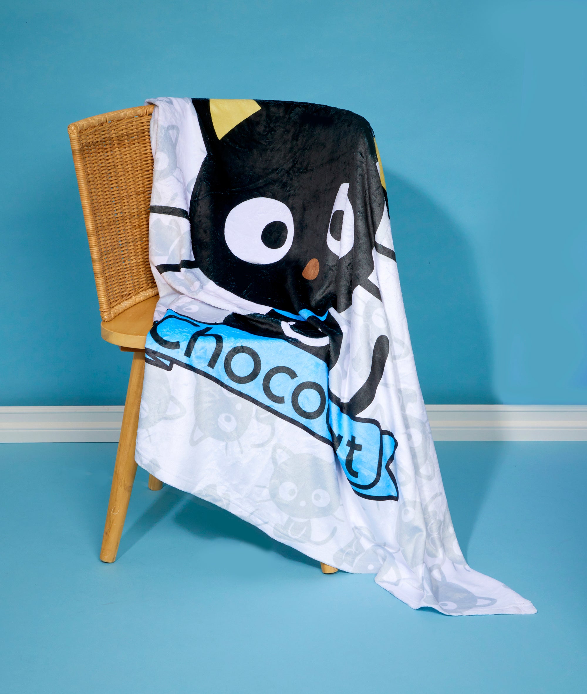 Close-up of the white reverse side of the Chococat blanket highlighting the quality material