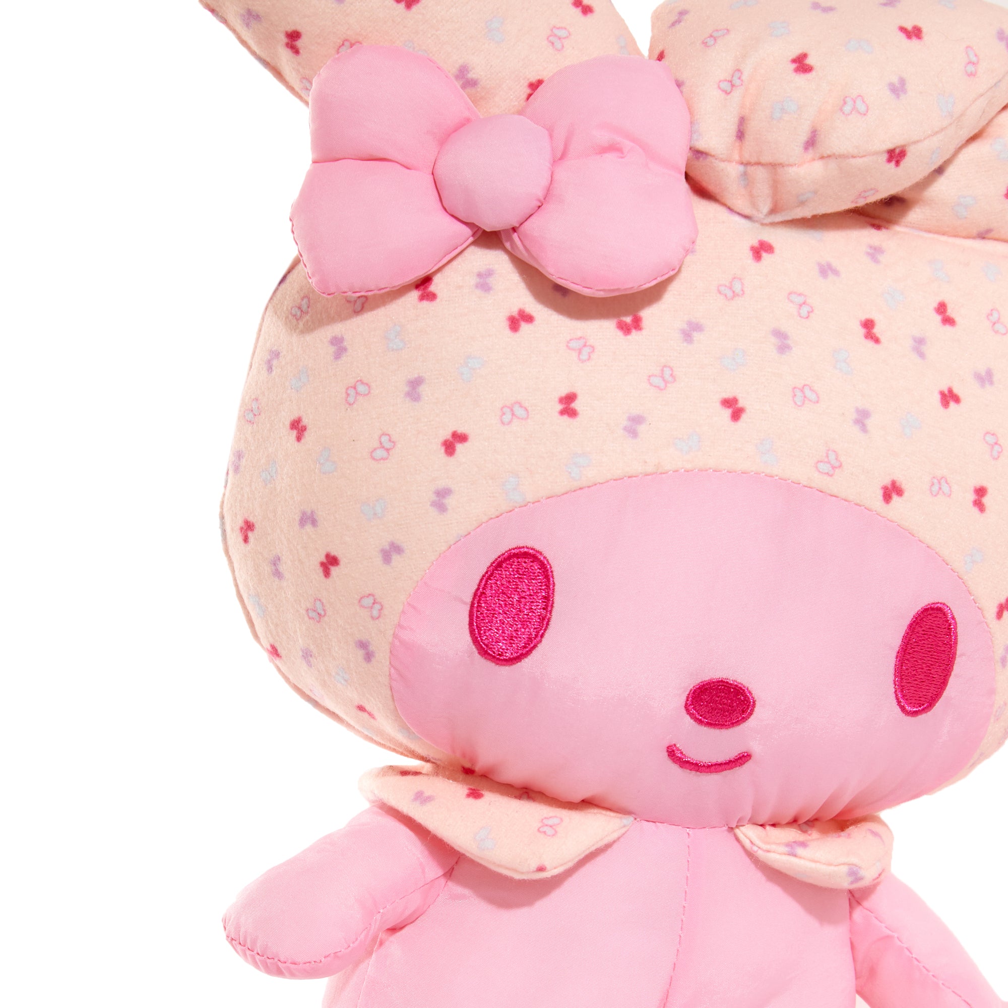 Front view of My Melody plush toy with spring monochromatic print