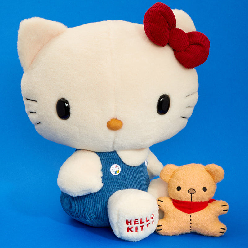 Backpack-ready Hello Kitty plush set in drawstring bag.