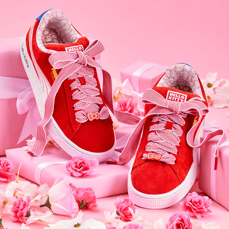 Hello Kitty x PUMA Womens Red Bow Suede XL Sneakers side view, showcasing the suede upper and thick laces