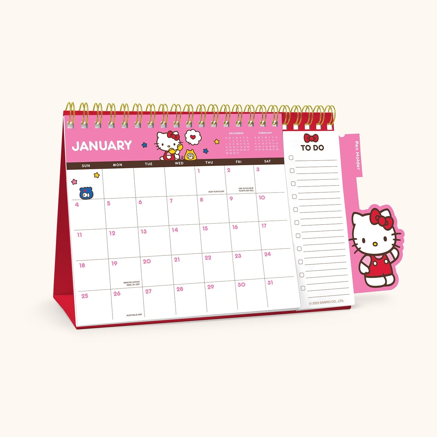 Hello Kitty 2026 desk calendar with colorful pages and pen holder.