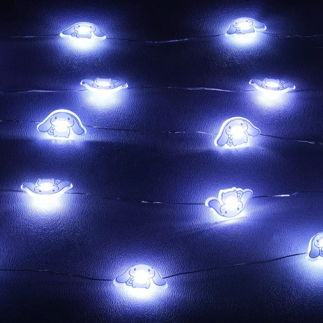 Full view of decorative led bulbs arranged across a wood shelf in a cozy room