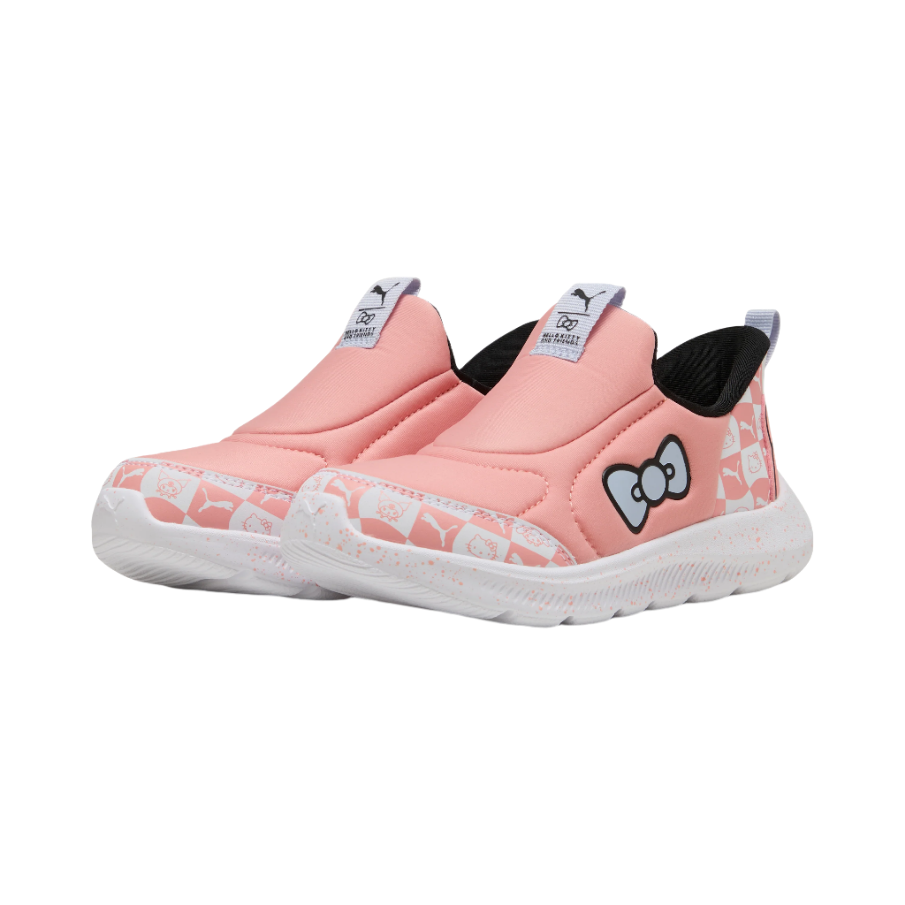 Kids wearing Hello Kitty sneakers while playing outdoors.