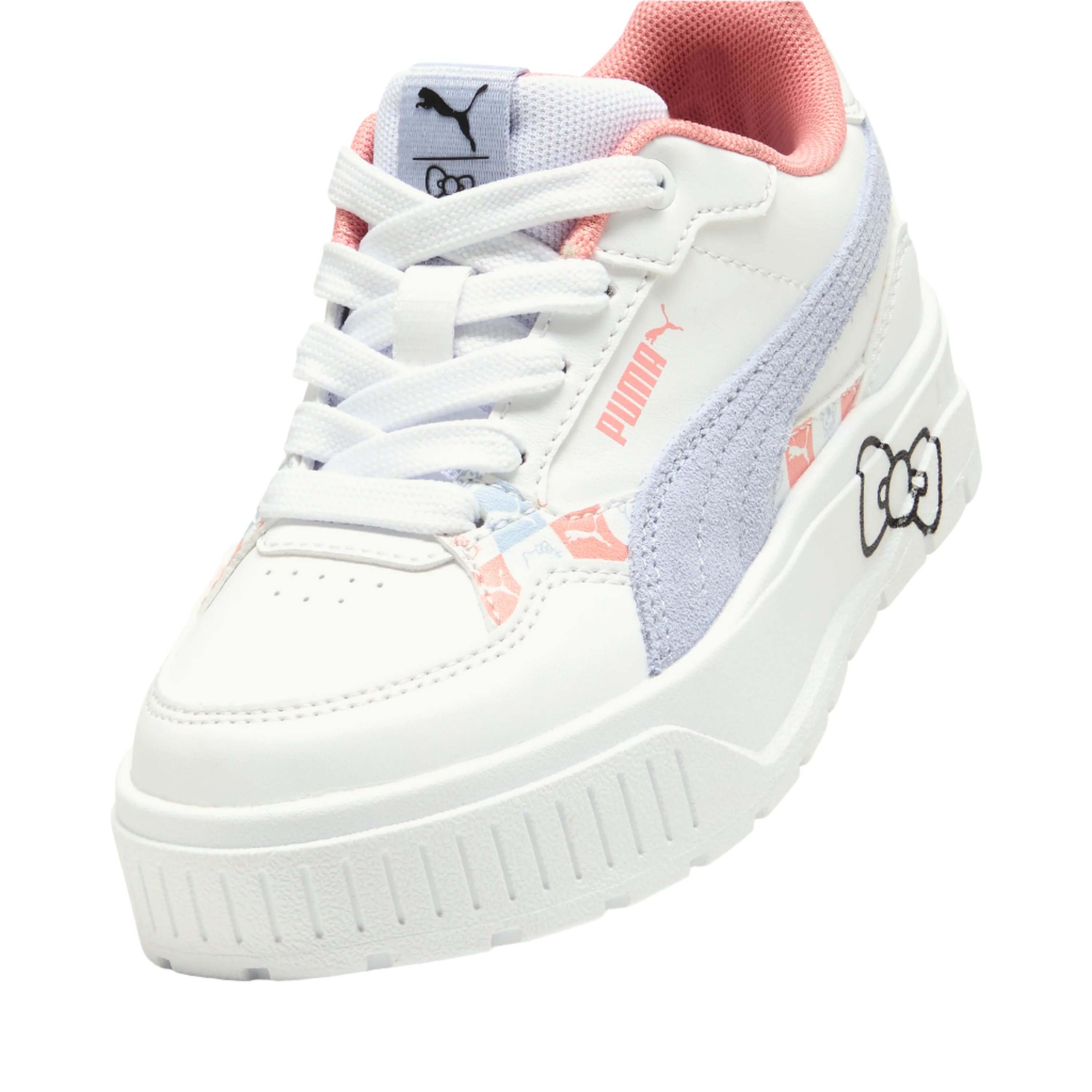 Top-down view of PUMA shoes with lace-up design and suede accents.