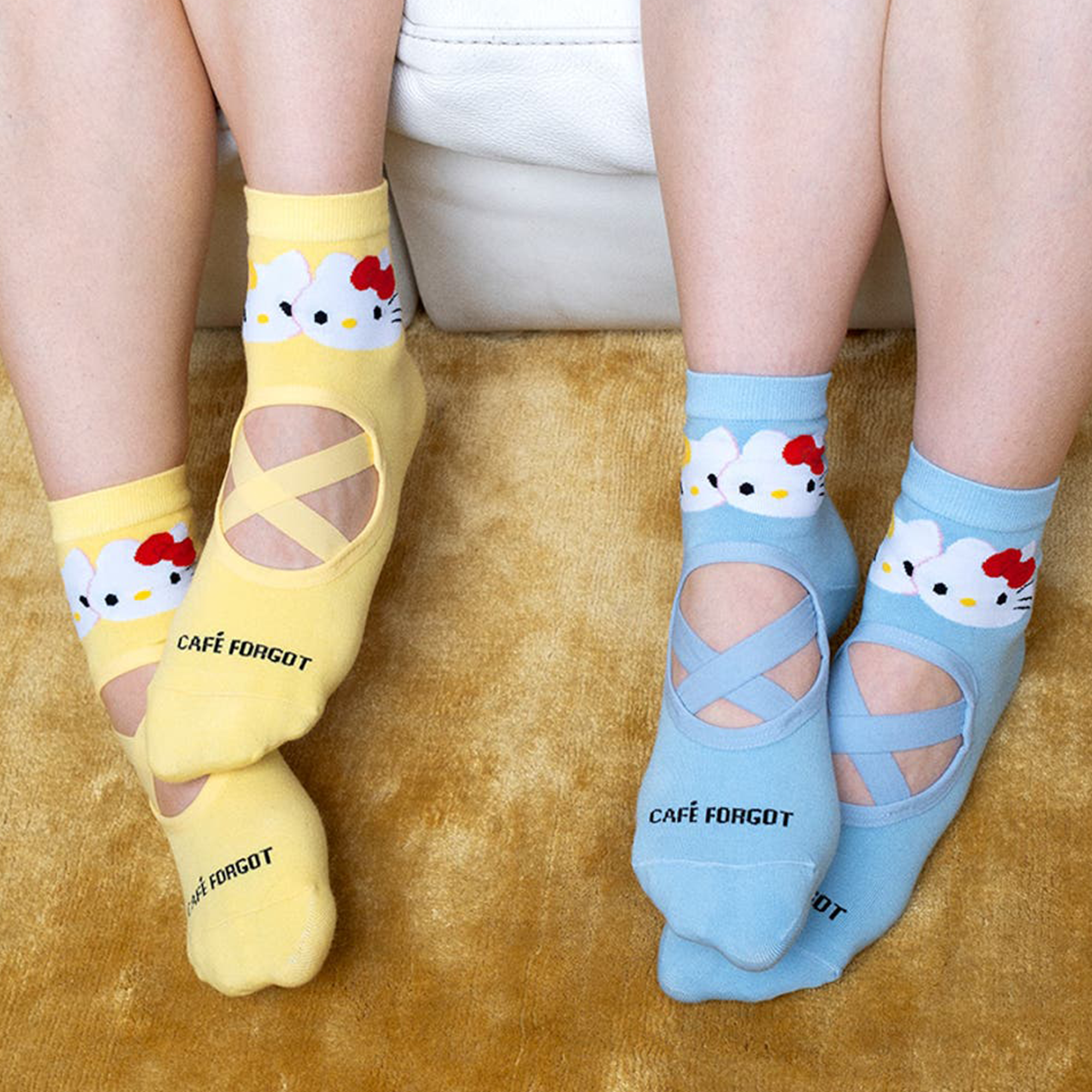 Close-up of the Hello Kitty design on the yellow ballet socks