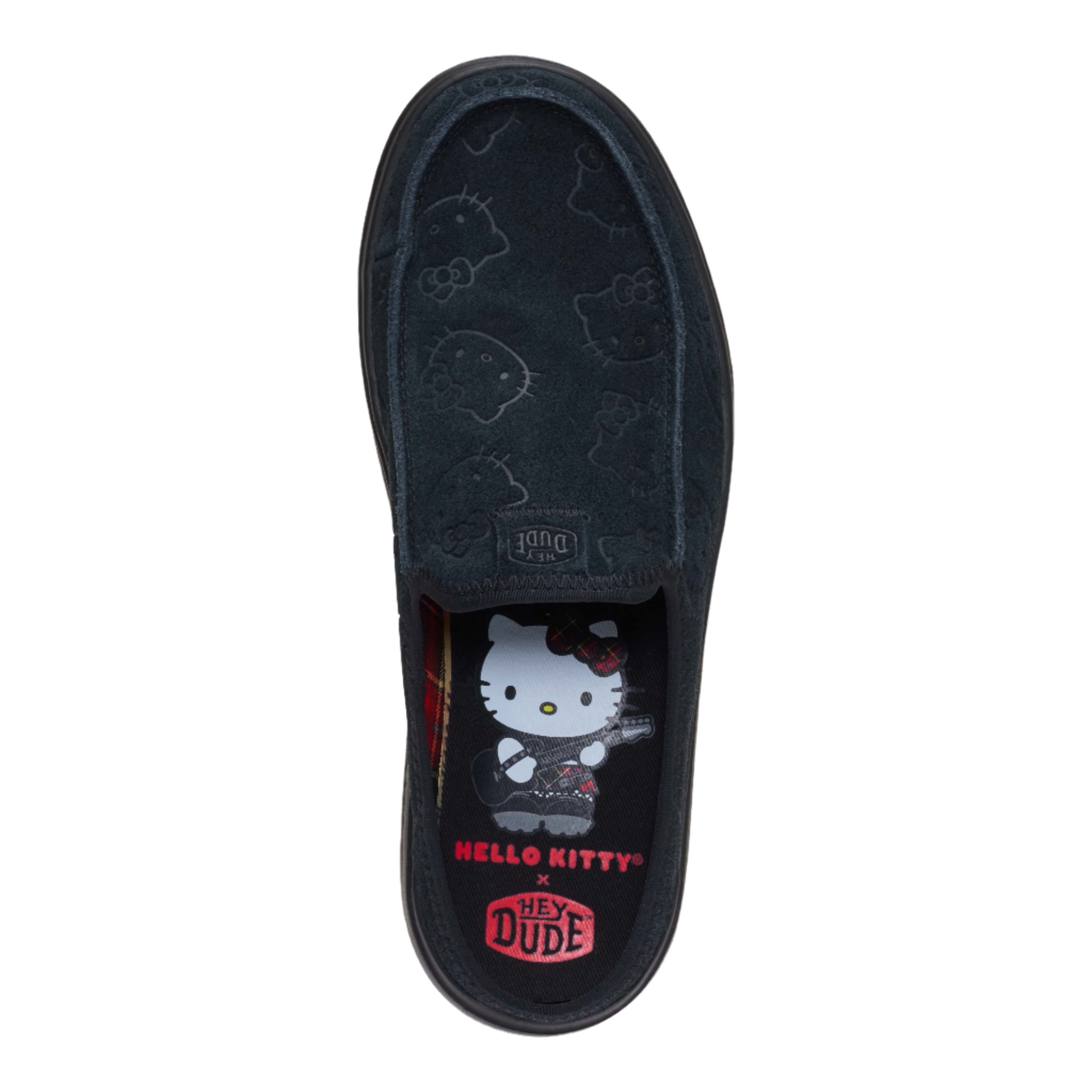 Woman wearing Hello Kitty x HEYDUDE shoes with casual outfit
