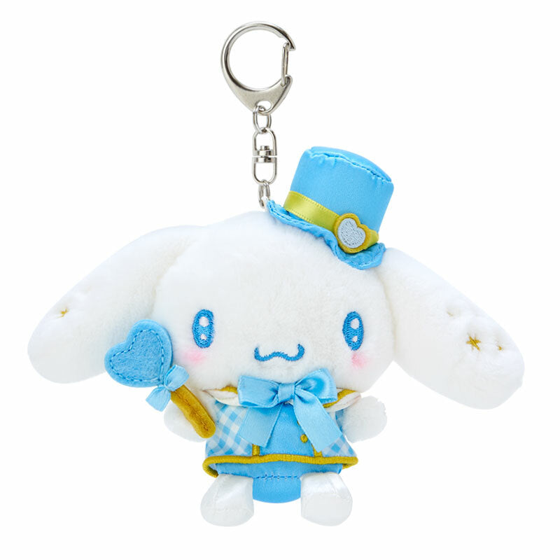 Close-up of Cinnamoroll plush keychain showing embroidered face and gingham outfit