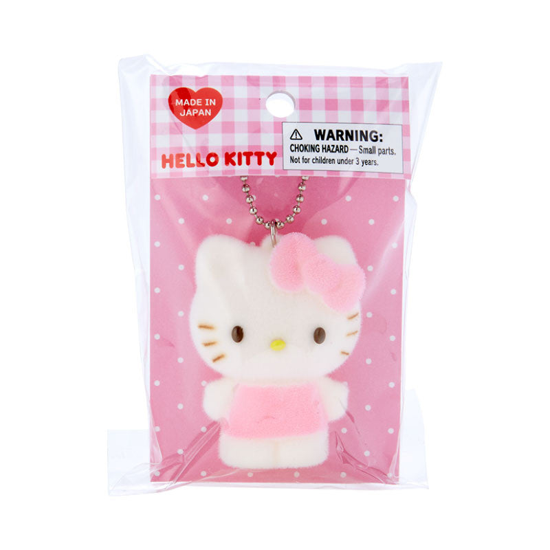 Close-up of Hello Kitty plush keychain showing flocked texture
