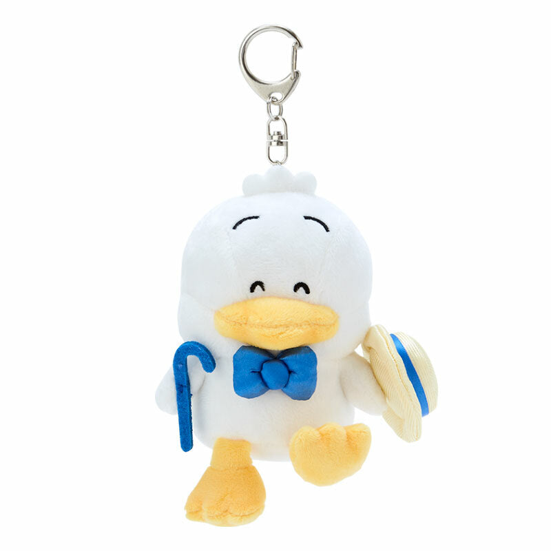 Pekkle mascot keychain clipped to a canvas tote during NYC weekend shopping