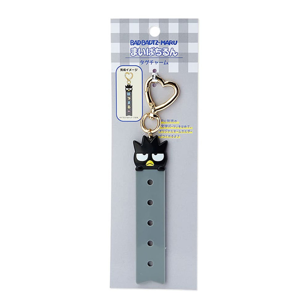 Top angle showing personalized charm inserts on custom made keychain