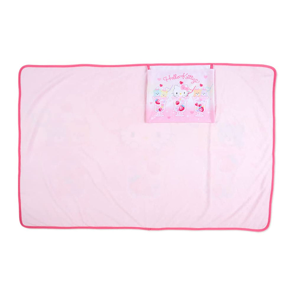 Closeup of lap blanket dimensions label next to built-in pouch