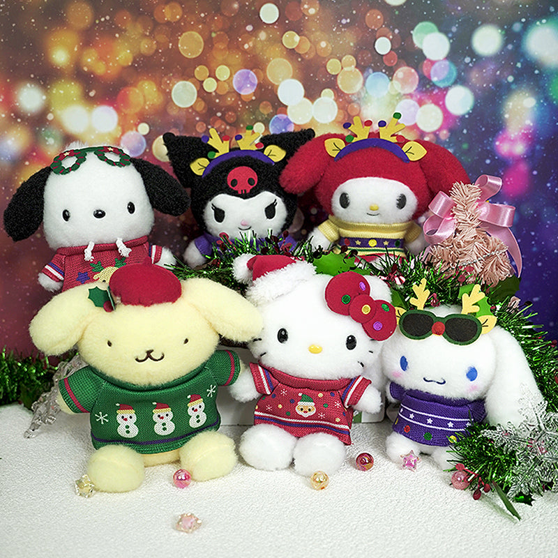 My Melody Sanrio plush toy in a holiday sweater with wreath and reindeer antler patterns, front view