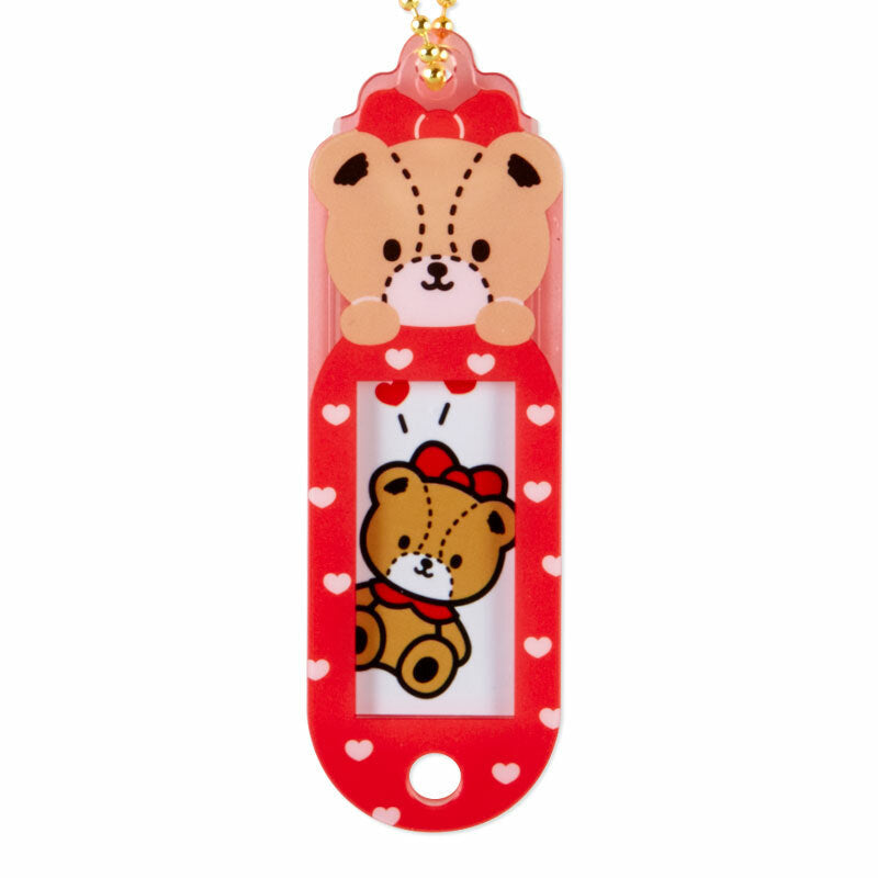 Close-up of the customizable slide-back feature on a Sanrio bag charm