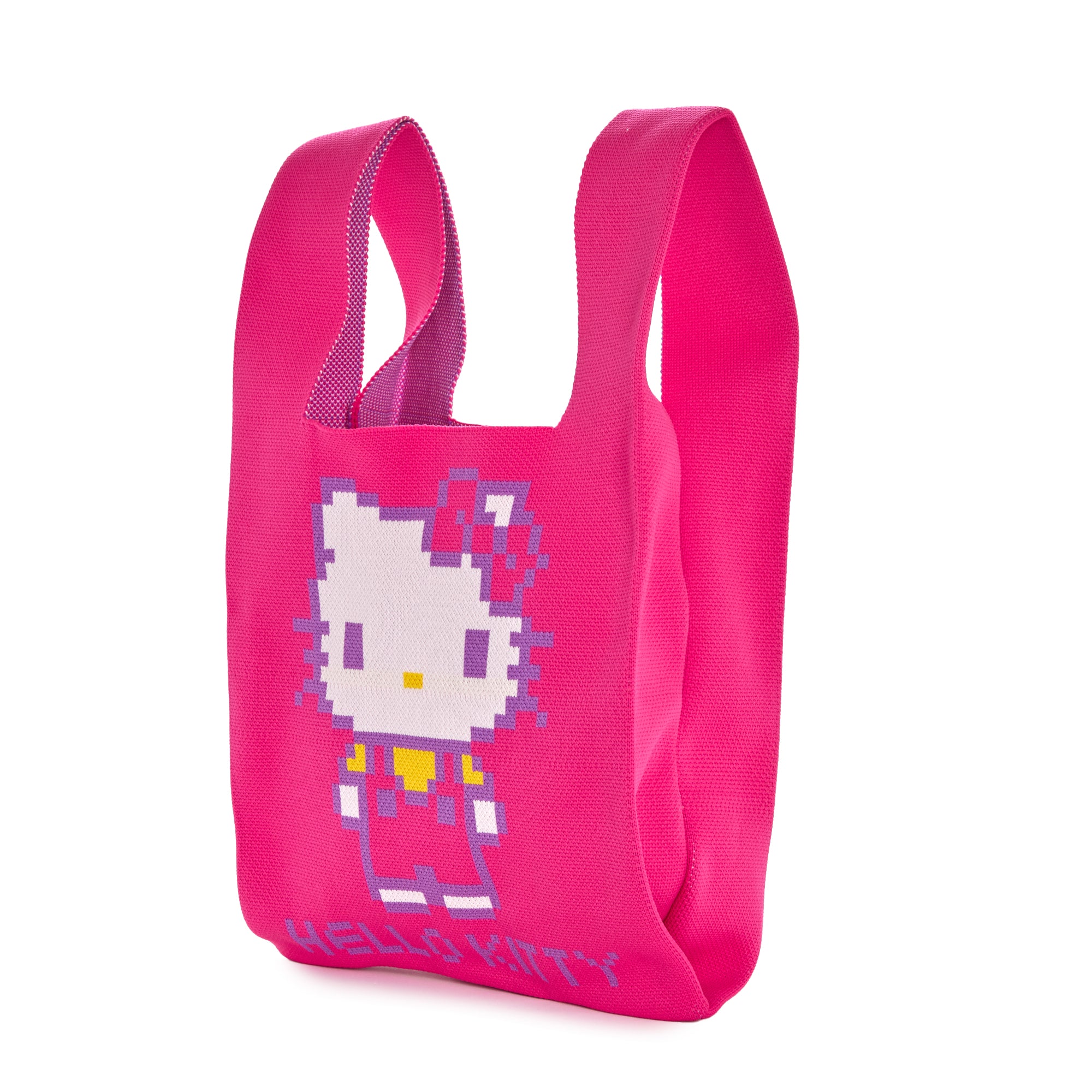 Lifestyle shot of shopper bag being carried outdoors in casual outfit