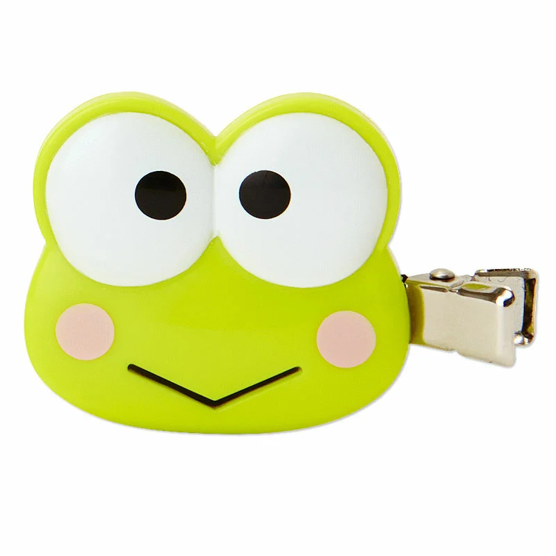 Keroppi hair clips displayed on a colorful background, showcasing their cute design and Sanrio branding.