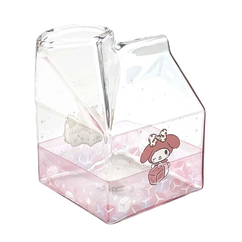 Side view of the milk carton-shaped glass cup filled with strawberry milk