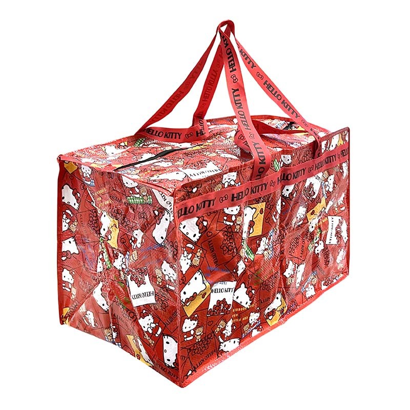Side view of Hello Kitty waterproof storage bag with foldable design, placed in garden.