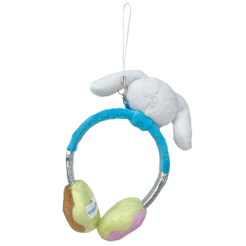 Side view of the plush keychain showing embroidered details