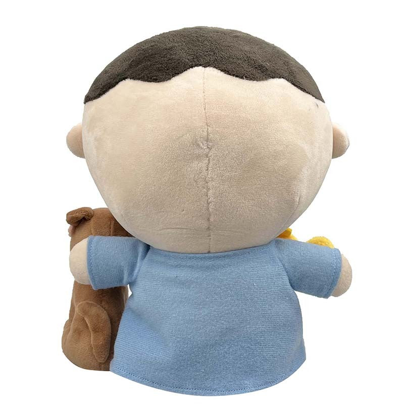 Side view of Tabo the plush toy, highlighting its vibrant colors.