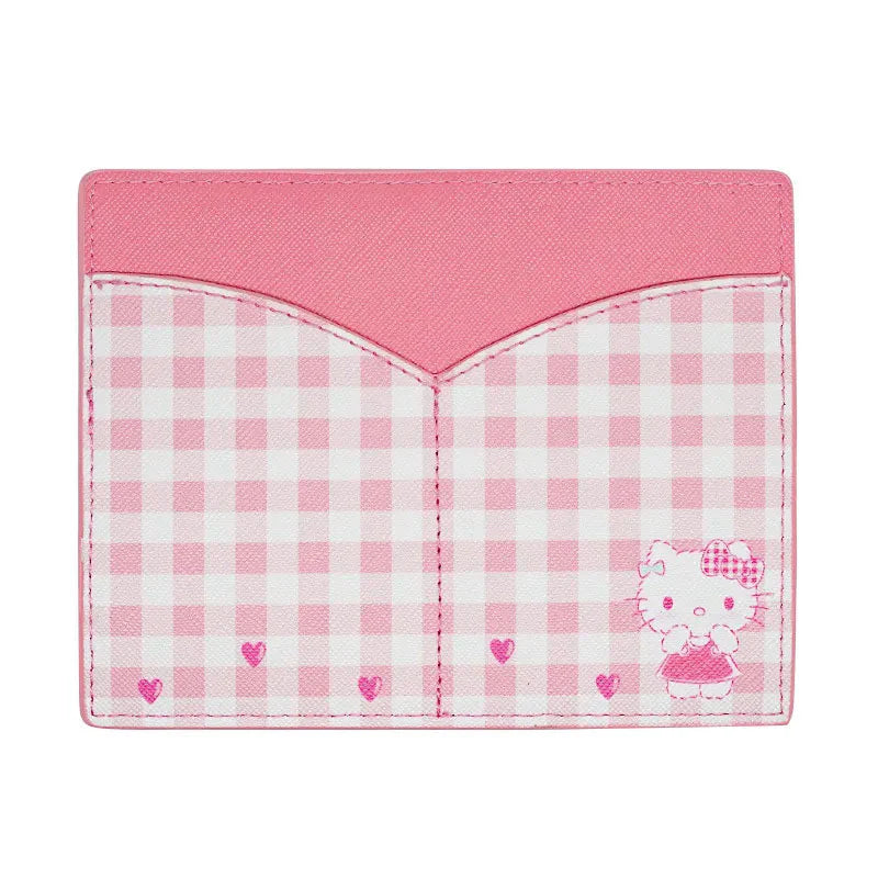 Open view showing the interior pockets of the Hello Kitty wallet.